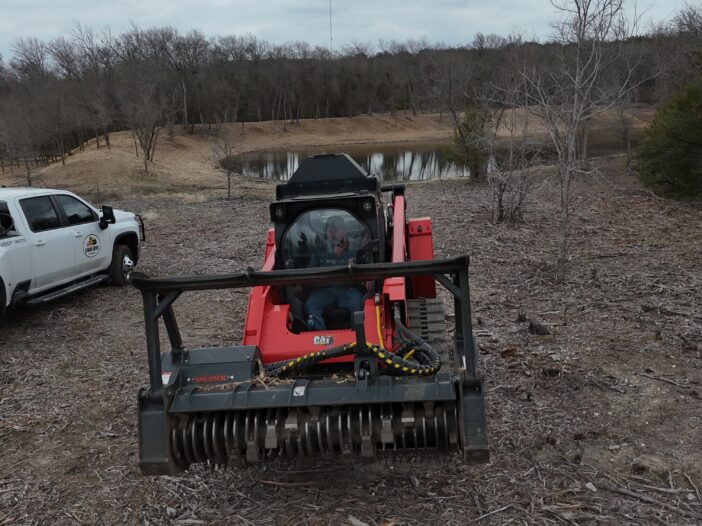 Skid Steer Mulcher finishing up land clearing project in Moody TX